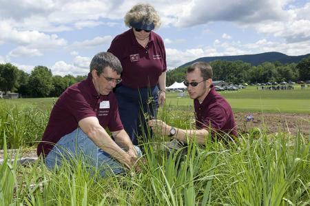 Extension's Mary Owen and Jason Lanier (center and right) review some of the latest research being conducted at the Joseph Troll Turf Research Center in South Deerfield with Jeffrey Doherty of the Department of Veterinary and Animal Sciences