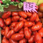 Figure 4. A “perino” type of tomato, also known as a “roma” type, for sale at a market in Rapallo, Liguria Italy in 2017. The variety name is San Marzano, a very popular variety in Italy and growing in popularity in the United States. A San Marzono type is recommended under “Heirloom/open pollinated” in Table 1.  (Photo by Frank Mangan)