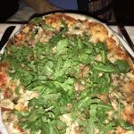 Figure 13. Arugula as a topping on a pizza at a restaurant in Liguria, Italy in 2017. (Photo by Franco Mangan)