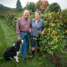 Joyce and Phil Wiley and their dog Sky at UMass Cold Spring Orchards