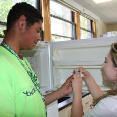 4-H student refrigerates DNA sample
