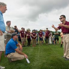 Turf Pathologist Dr. Geunhwa Jung talks to visitors about turf disease management research underway at the Center