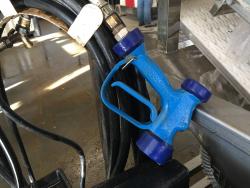 A blue hose nozzle