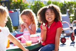 children eating outside