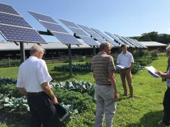 Dual-Use Solar Researchers, including Stephen Herbert and Jake Marley, at the South Deerfield Crop and Animal Research and Education Farm. 