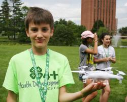 4-H camper holds drone