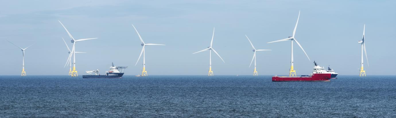 Offshore wind turbines with boats