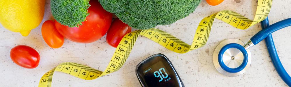 healthy foods, measuring tape, stethoscope